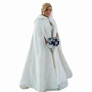 Detailed view of the white plush hooded winter bridal cape showcasing soft warm fabric.