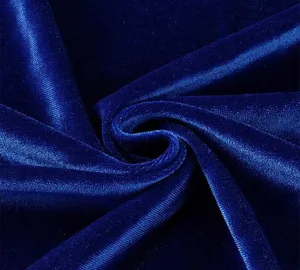 Royal blue velvet fabric detail closeup, soft plush texture, premium material swatch.