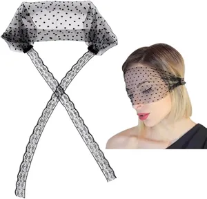 Black polka dot mesh blindfold lace tie veil closeup detail shot, perfect for fashion party.