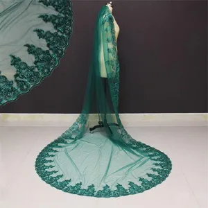 Dark green bridal veil with intricate lace embroidery and shimmering sequins for weddings.