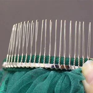 Bridal dark green veil metal comb detail close-up showing secure stitching and elegant design.