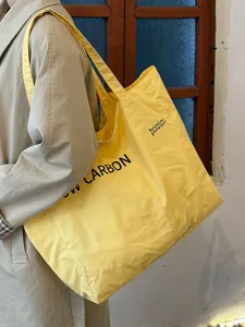 Casual yellow canvas tote bag, large capacity single shoulder bag for women daily use.