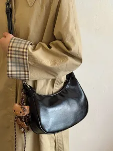 Schwarze Retro Hobo Umhängetasche für Damen, vielseitige minimalistische Tasche für Alltag.