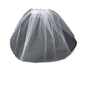 Short bridal white veil vintage mesh headpiece wedding accessory for photo shoot ceremony.