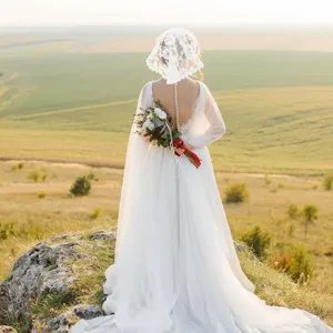 Exquisite bridal lace veil with floral pattern, elegant wedding headpiece for women.