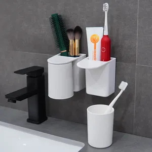 Supporto per spazzolino magnetico da parete, set di tazze in plastica bianca per bagno.
