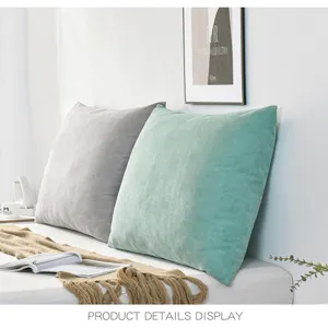 Close-up of cozy velvet throw pillows on bed, soft texture, modern bedroom decor detail.