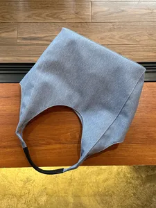 Blue denim shoulder bag for women, casual hobo tote bag, large capacity daily commuting bag.