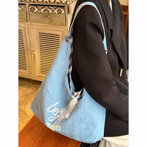 Korean lazy style canvas shoulder tote bag, large capacity casual blue commuting handbag for women.