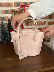 Sac à main seau rose avec joli ruban nœud et poignée de perles, sac quotidien chic.