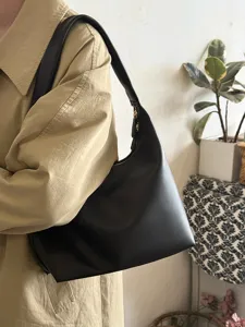 Minimalist black soft leather underarm shoulder bag for women, casual lazy style hobo bag.