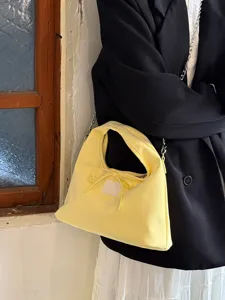 Σικ ανοιχτό κίτρινο τσάντα ώμου με φιόγκο, μινιμαλιστική casual τσάντα χειρός με αλυσίδα.