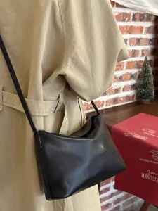 Korean style minimalist soft leather shoulder bag, trendy underarm hobo bag for women daily commute.