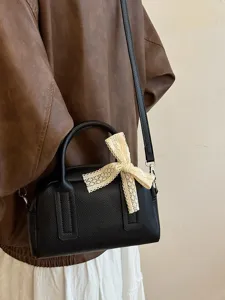 Korean chic black Boston pillow bag with cute beige lace bow, versatile shoulder and crossbody.