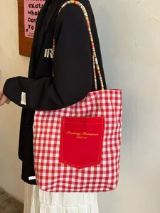 Koreanischer Stil rot-weiße karierte Segeltuch-Tragetasche mit Vordertasche für die Arbeit.