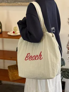 Koreanischer Stil große Kapazität lässige Canvas Tasche Schultertasche mit Buchstaben Druck.