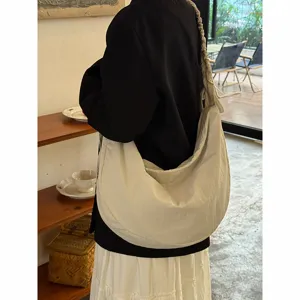 Korean style pleated drawstring cloud bag for women, large capacity casual shoulder crossbody bag.