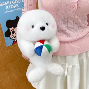 Cute white seal plush toy holding a colorful ball soft stuffed animal doll gift for kids.