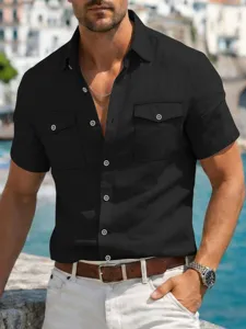 Detail view of men's short sleeve linen work shirt featuring double chest pockets.
