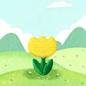 Detailed view of yellow tulip embroidery patch featuring textured green leaves in rainy scenery.