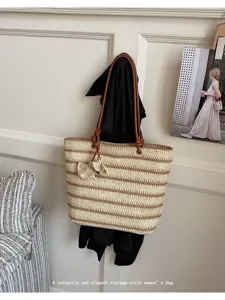 Summer straw woven tote bag, large capacity casual shoulder bag for beach and daily commute.