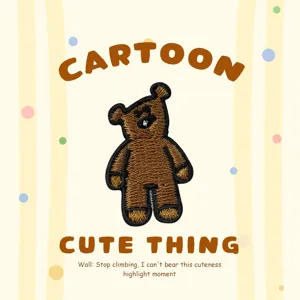Korean style cute cartoon bear embroidered patch detail, iron on decorative badge, fine stitching.