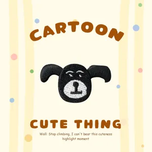 Detailed view of the cute cartoon animal embroidery patch, close-up of fine stitches.