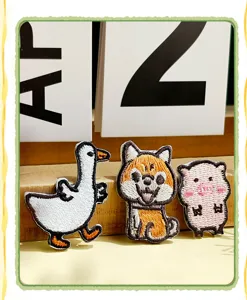 Cute animal embroidery patches set featuring duck shiba inu and pig for DIY clothing repair.