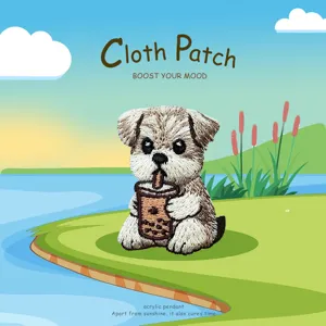 Detailed view of the cute cartoon puppy boba tea embroidery cloth patch for DIY apparel decoration.