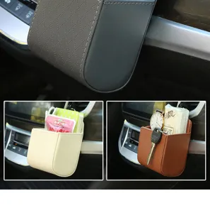 Car air vent storage pocket detail view, premium leather organizer for phone, cards and keys.