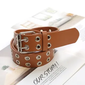 Detail view of a brown double grommet leather belt featuring metal eyelets and double pin buckle.