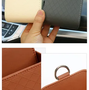 Car leather air vent storage box organizer for mobile phones, cards and coins.