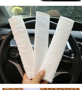 White car seatbelt shoulder pads, soft plush waffle seat belt covers for comfort.