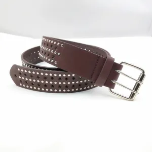 Dark brown PU leather belt with metal studs and star cutouts, detailed shot of double-prong buckle.