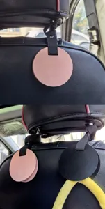 Detailweergave autostoel haak, PU lederen verborgen opslag hanger voor voertuig hoofdsteun.