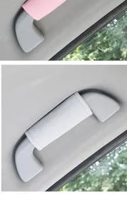 Detailed view of car roof grab handle cover, soft fabric interior protection accessory.