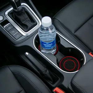 Universal car cup holder coasters, black and red honeycomb silicone anti-slip mats for auto interior.