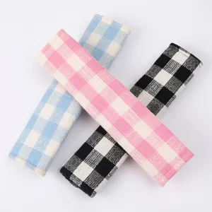 Plaid car seat belt shoulder pads, soft fabric protective covers for comfortable driving.