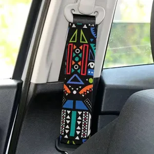 Car seatbelt shoulder pad with bohemian colorful geometric print on black background soft cover