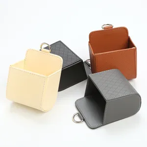 Car air outlet leather storage box, hanging pocket organizer for phone, cards, and keys.