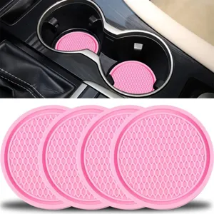 Set of 4 pink silicone car cup coasters with non-slip grid pattern for automotive interior use.