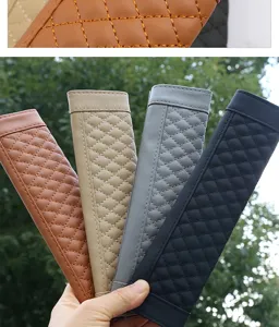 Car seat belt cover detail showing soft quilted leather padding in multiple colors for comfortable driving.
