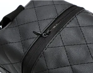 Black quilted leather car tissue box organizer detail shot, durable and stylish interior accessory.