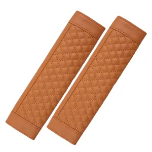 Brown quilted car seat belt pads 2pcs set soft leather shoulder protective covers for auto interior.