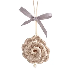 Handmade crochet rose car hanging ornament with grey bow ribbon and pearl pendant decor.