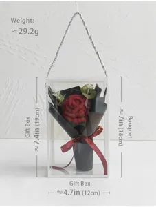 Handmade crochet red rose bouquet in clear gift box with hanging rope detail display view.