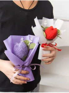 Hand-crocheted wool flower bouquet featuring romantic heart design for special holiday gifts.