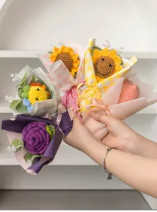 Handmade crochet sunflower and rose bouquet detail showcasing exquisite yarn weaving craftsmanship.