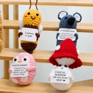 Handmade crochet cute animal doll with positive energy card, creative knitted ornament.