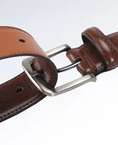 Men genuine leather belt detail close-up, brown cowhide pin buckle retro trousers accessory